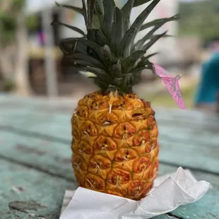 a pineapple on a napkin