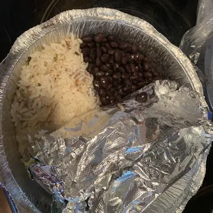 Rice and black beans with the surf'in sweet pork tacos.  It was very delicious