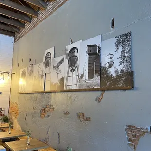 the interior of a restaurant with tables and chairs