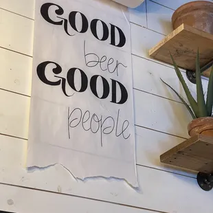 a sign on the wall of a restaurant