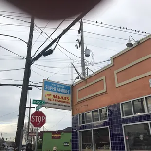 a stop sign in front of the store
