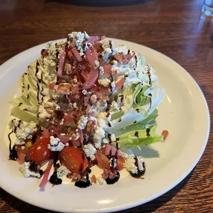 Wedge salad, blue cheese and bacon crumbles.