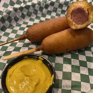Mini corn dogs. They like half a hot dog! Bigger than mini!
