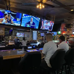 people sitting at the bar