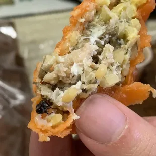 Empanada with fly topping