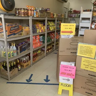 a grocery store with shelves of food