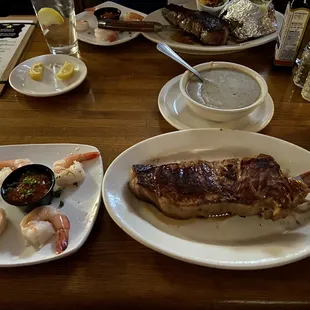 KC strip, salad, fries and gravy with shrimp cocktail for $36.
