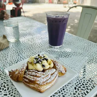 Pistachio and apricot preserves filled Croissant from bloom bake shop. Ube latte from Cafe Domestique