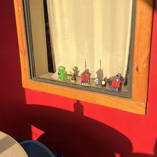 Some of our painted ceramics on the windowsill of the pirate ship condo - the kids were so proud