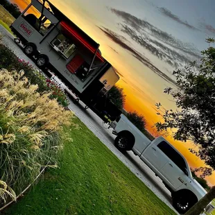 a white truck parked in a parking lot