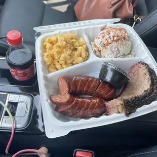2 meat plate with house sausage, brisket, potato salad, and Mac-n-cheese