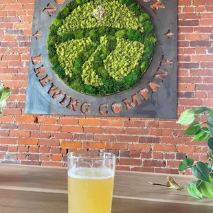 a glass of beer on a table