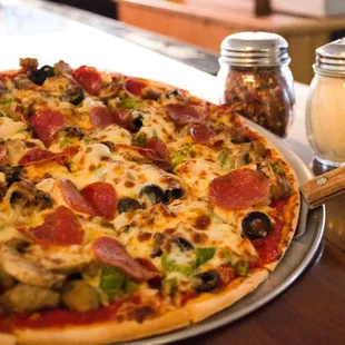 pepperoni, olives, and pepperoni pizza