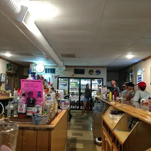 customers sitting at the bar