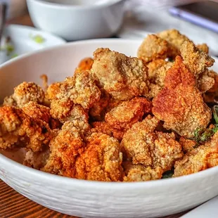 a bowl of fried chicken