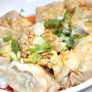 Pork Wontons in Spicy Chili Sauce.