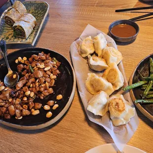 Kung Pao Chicken, Beef Roll, pan fried chicken dumplings and sauteed green beans.