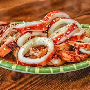 a plate of food on a wooden table