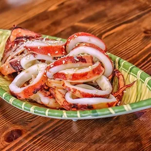 a plate of food on a wooden table