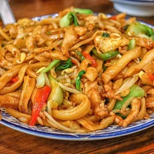 a plate of stir fried noodles