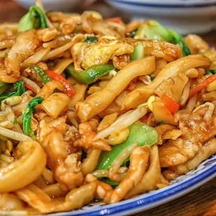 a plate of stir fried noodles