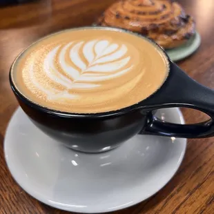 a cup of cappuccino on a saucer
