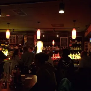 people sitting at a bar