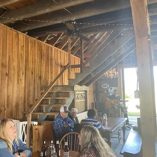 a group of people sitting around a table