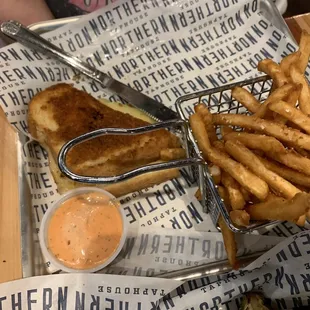a basket of fries and a sandwich