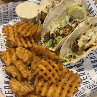 Walleye tacos with waffle fries &amp; seasoned sour cream