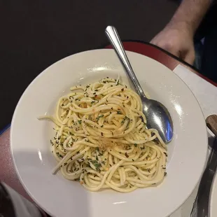 Side of pasta with oil and cheese