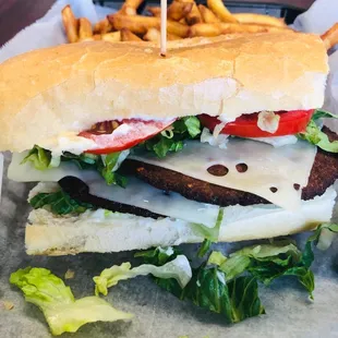 A hearty Half a hot sausage poboy (note 2 patties)