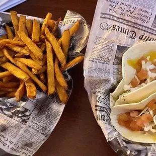 Sweet potato fries and 2 grilled fish tacos!