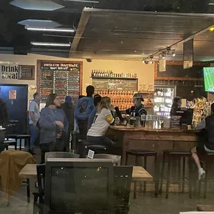 people sitting at the bar