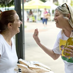 two women talking to each other