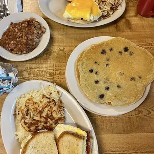Wazoo w hash browns, Maiden Lane w hash browns ($9.25), short stack of blueberry pancakes ($6.35), Side of Apple Sauce ($1.39)