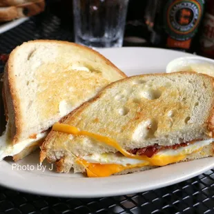 Maiden Lane ($9.25) - grilled sourdough with two fried eggs, cheddar cheese, and bacon. Subbed applesauce for hash browns