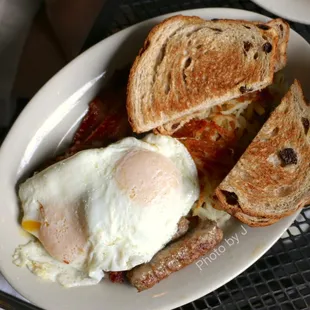 Huron Sampler Breakfast ($11.69) - 2 eggs, a short order of corned beef hash, 2 sausage links, and 2 strips of bacon