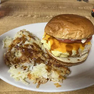 Egg Sandwich with andouille sausage on brioche bum