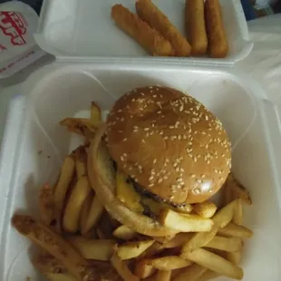 Double cheeseburger with fries and mozzarella sticks