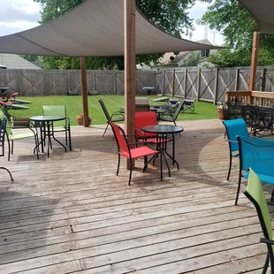 patio area with tables and chairs