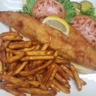 a plate of fish and fries