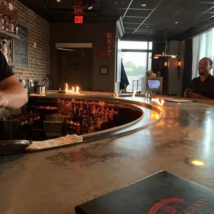 a man standing at the bar