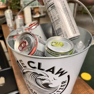 a bucket full of cans