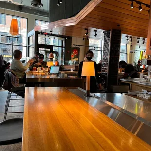 people sitting at the bar