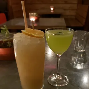 two cocktails on a table