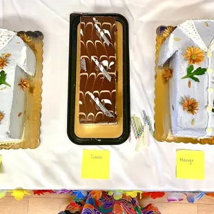 Our cake table. The two cakes on the sides are from Northstar. Tuxedo cake in center from Costco.