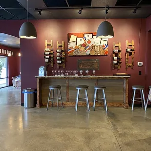 a wine tasting room with a bar