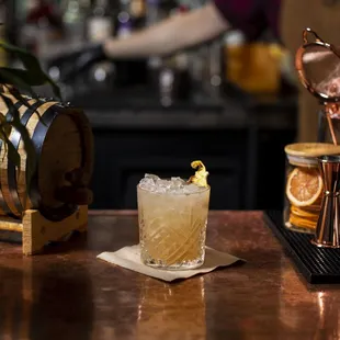 a cocktail on a bar counter