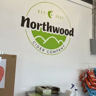 the logo on the wall